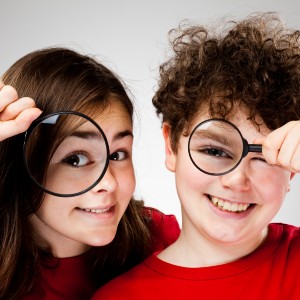 kids with magnifying glasses