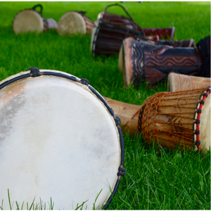 Photo of drums in grass