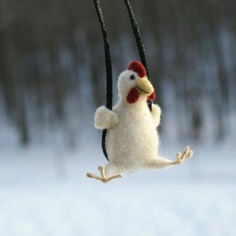 felted duck on a swing