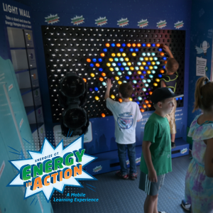 Photograph of mobile exhibit with energy in action logo