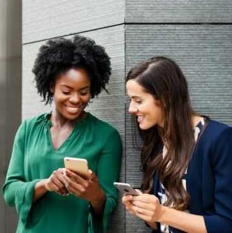 Women Trading Investment Tips on Phones