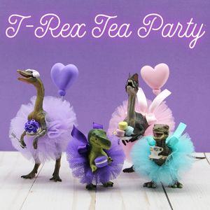 Dinosaur toys in tutus and bows