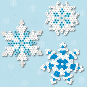 Blue and white beads form snowflakes against a light blue background.