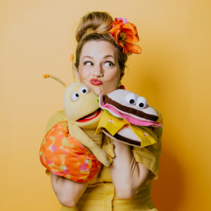 Photo of Erin Shea with puppets