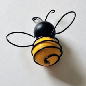 A small bee made of beads and wire