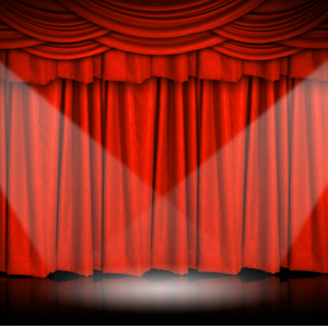 Photo of stage with red curtain
